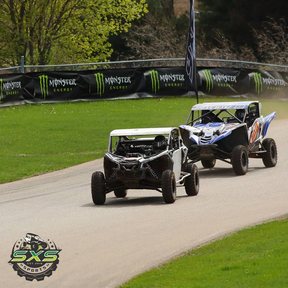 Two sxs's racing in the SXS Sports Spring National at the U.S. Air Motorsports Raceway in Shawano Wisconsin