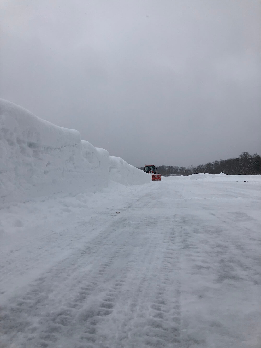 Snow blower clearing off the race track for the Twin Bridge Takedown in northern Wisconsin
